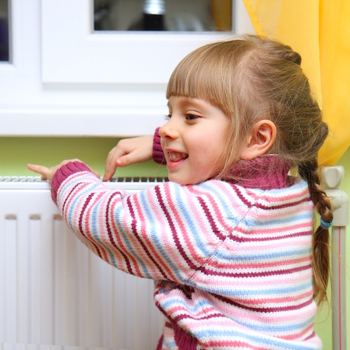girl and radiator Aptus Environmental, girl and radiator